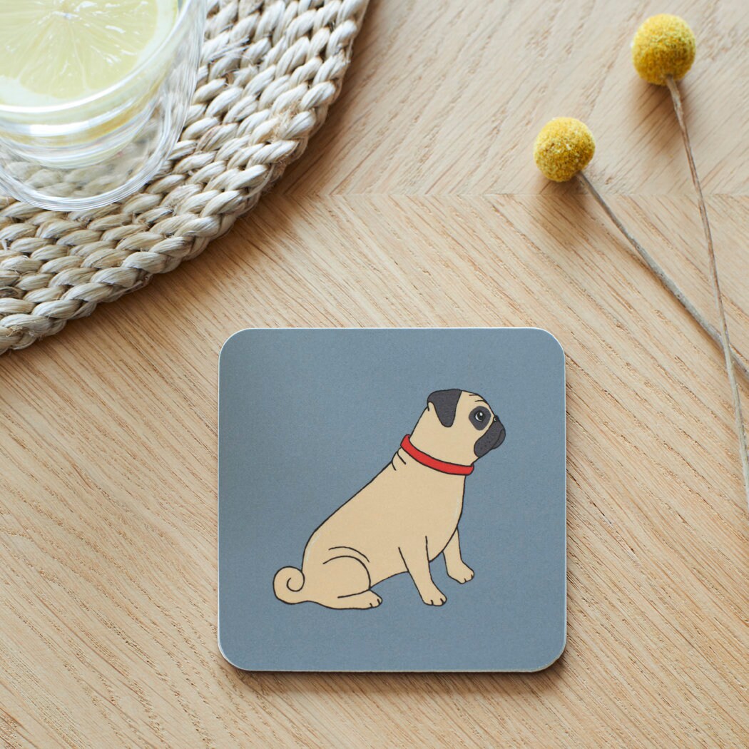 Close-up of Pug coaster — sustainably sourced eucalyptus wood with cork backing, heat-resistant and easy to wipe clean 