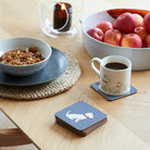 Westie coaster on desk — eucalyptus wood with cork backing, dog lover gift by Sweet William Designs