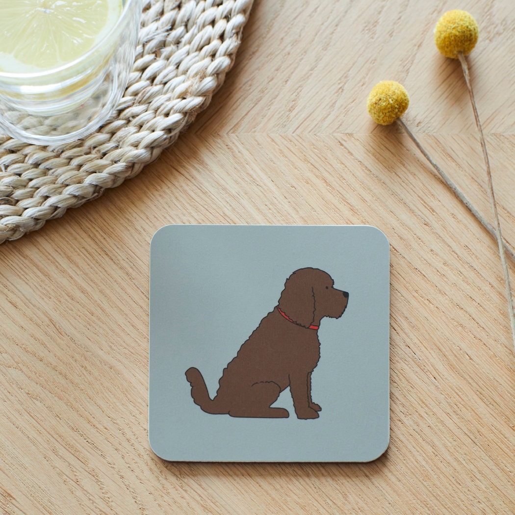 Close-up of Chocolate Cockapoo / Labradoodle coaster — sustainably sourced eucalyptus wood with cork backing, heat-resistant and easy to wipe clean
