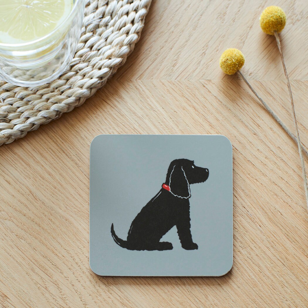 Close-up of Black Cocker Spaniel coaster — sustainably sourced eucalyptus wood with cork backing, heat-resistant and easy to wipe clean