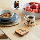Lurcher coaster on desk — eucalyptus wood with cork backing, dog lover gift by Sweet William Designs