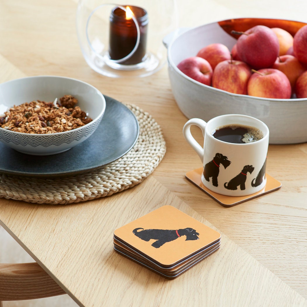 Black Schnauzer coaster on desk — eucalyptus wood with cork backing, dog lover gift by Sweet William Designs