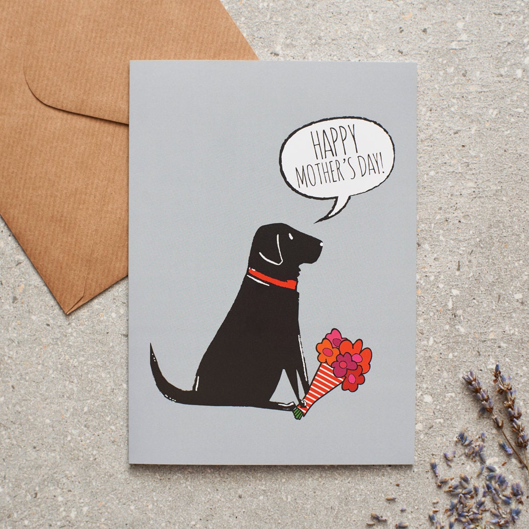 Black Labrador Mother's Day card featuring illustrated Black Labrador holding flowers — blank inside, supplied with kraft envelope, by Sweet William Designs