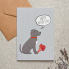 Staffie Mother's Day card featuring illustrated Staffie holding flowers — blank inside with optional handwritten message, perfect gift for dog mums