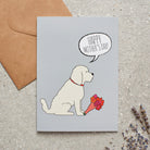 Cockapoo / Labradoodle (Apricot) Mother's Day card featuring illustrated Apricot Cockapoo holding flowers — blank inside, supplied with kraft envelope, by Sweet William Designs