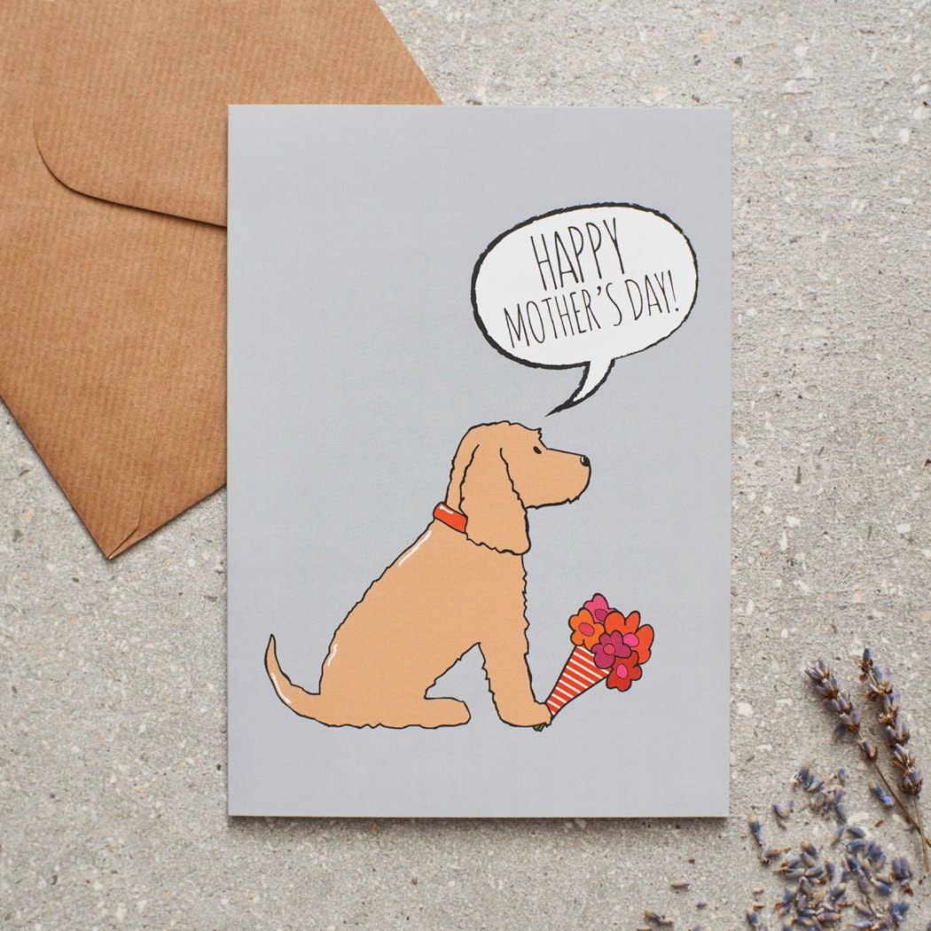 Cocker Spaniel (Golden) Mother's Day card featuring illustrated Golden Cocker Spaniel holding flowers — blank inside with optional handwritten message, perfect gift for dog mums