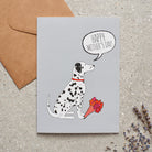 Dalmatian Mother's Day card featuring illustrated Dalmatian holding flowers — blank inside with optional handwritten message, perfect gift for dog mums