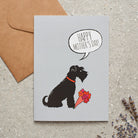 Black Schnauzer Mother's Day card featuring illustrated Black Schnauzer holding flowers — blank inside with optional handwritten message, perfect gift for dog mums