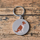 Close-up of Liver & White Springer Spaniel dog ID tag — silver-plated brass with illustrated Springer Spaniel design, personalised dog tag by Sweet William Designs