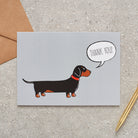 Dachshund thank you card featuring a charming illustrated sausage dog with a red collar and a ‘Thank You!’ message, a lovely way to show a dog lover your appreciation