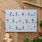 Dog walker Christmas card — illustrated parade of festive dog walkers and their dogs, dog lover Christmas gift by Sweet William Designs