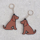 Chocolate Cocker Spaniel keyring showing both sides — double-sided PVC design with Sweet William's classic illustration