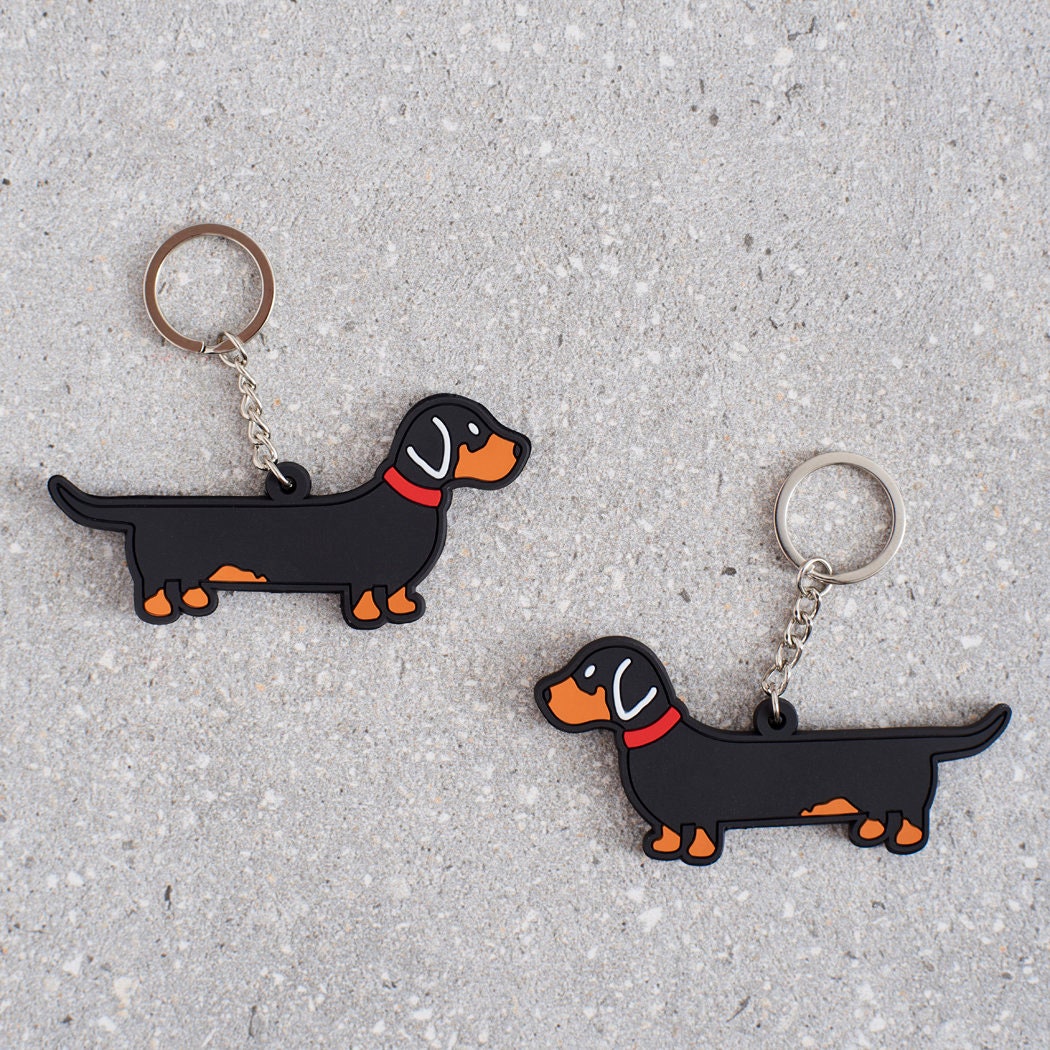 Dachshund keyring showing both sides — double-sided PVC design with Sweet William's classic illustration