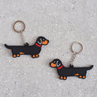 Dachshund keyring showing both sides — double-sided PVC design with Sweet William's classic illustration