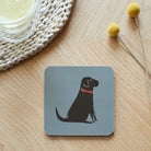 Close-up of Black Labrador coaster — sustainably sourced eucalyptus wood with cork backing, heat-resistant and easy to wipe clean 