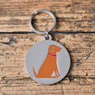 Close-up of Fox Red Labrador dog ID tag — silver-plated brass with illustrated Fox Red Lab design, personalised dog tag by Sweet William Designs