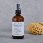 Sweet William Organic Sleepy Dog Spritz bottle with a natural sponge, a calming vegan dog spray for bedtime