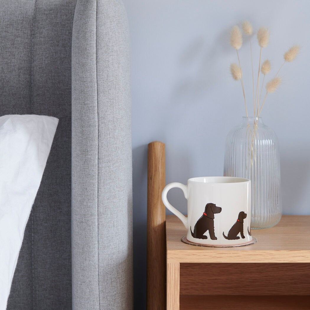 Sweet William Chocolate Cocker Spaniel Mug on a bedside table — Chocolate Cocker Spaniel dog lover gift mug