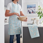 Apricot Cockapoo repeat pattern apron — thick organic cotton canvas with front pocket and adjustable strap, by Sweet William Designs