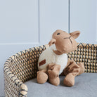 Close-up of Woolliam the Lamb dog toy in a wicker basket — soft fleece and fabric plush toy by Sweet William Designs