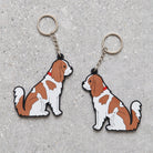 Cavalier King Charles Spaniel keyring showing both sides — double-sided PVC design with Sweet William's classic illustration