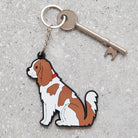 Cavalier King Charles Spaniel keyring held in hand — personalised double-sided PVC dog lover gift by Sweet William Designs