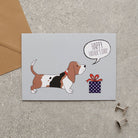 Basset Hound Father's Day card — illustrated dog with gift and 'Happy Father's Day' message, dog lover gift by Sweet William Designs