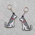 Husky and Alaskan Malamute keyring showing both sides — double-sided PVC design with Sweet William's classic illustration