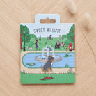 Staffie enamel dog pin on Sweet William Designs park scene backing card — thoughtful gift for Staffie lovers