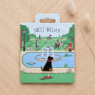 Black Labrador enamel dog pin on Sweet William Designs park scene backing card — thoughtful gift for Black Labrador lovers