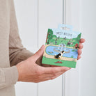 Border Collie enamel dog pin held in hands on illustrated park backing card — gold-plated dog lover gift by Sweet William Designs