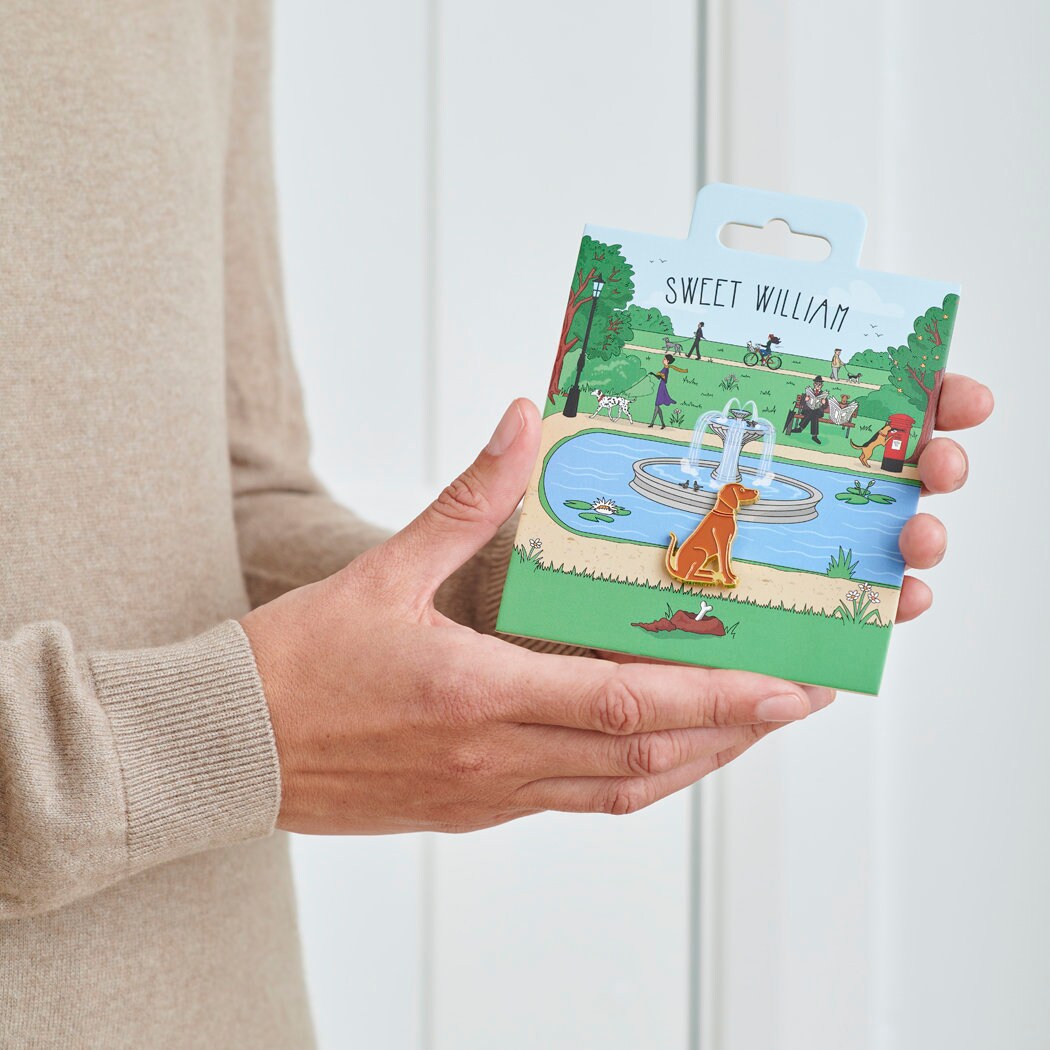Vizsla enamel dog pin held in hands on illustrated park backing card — gold-plated dog lover gift by Sweet William Designs
