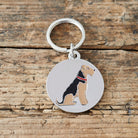 Close-up of Airedale Terrier dog ID tag — silver-plated brass with illustrated Terrier design, personalised dog tag by Sweet William Designs