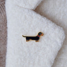 Dachshund enamel pin worn on a wool jacket collar — gold-plated dog pin, perfect gift for dog lovers