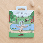 Dalmatian enamel dog pin on Sweet William Designs park scene backing card — thoughtful gift for Dalmatian lovers