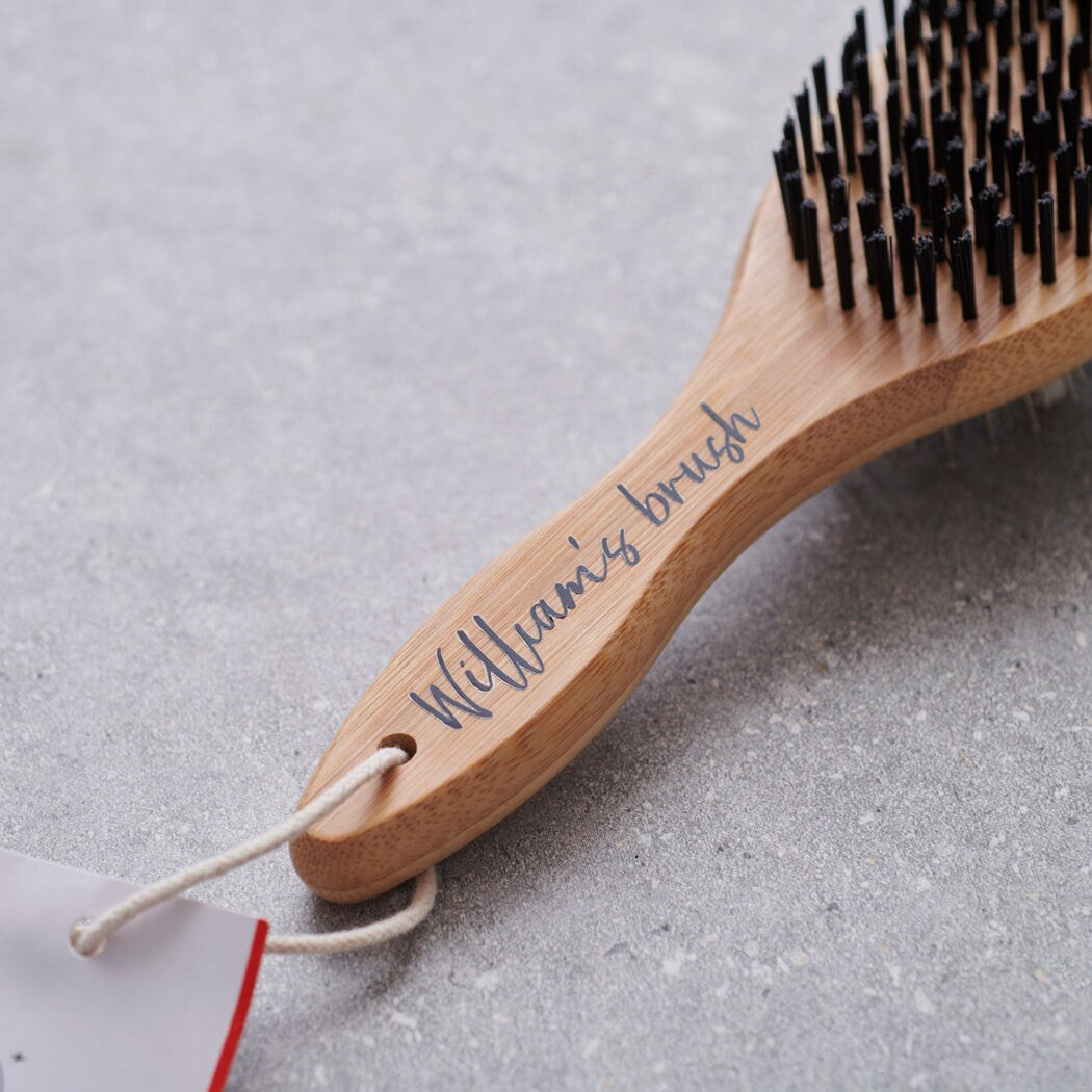 Close-up of bamboo double sided brush handle personalised with name — gift for dog by Sweet William Designs