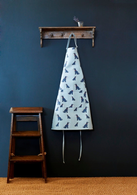 Grey Schnauzer organic cotton apron with handy front pocket and adjustable neck strap — ideal gift for Schnauzer owners and keen cooks