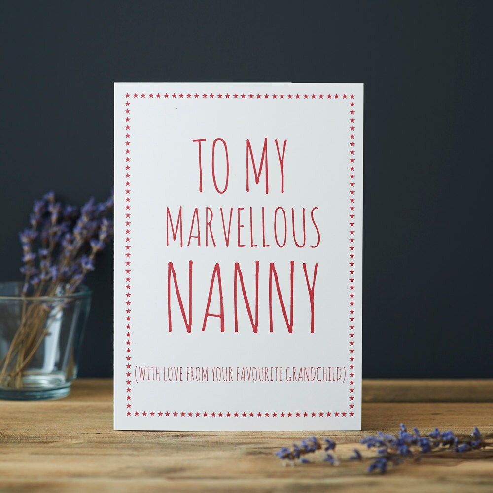 A playful birthday card for a marvellous Nanny, perfect for reminding her who her favourite grandchild is, photographed with dried flowers on a wooden table
