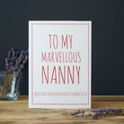 A playful birthday card for a marvellous Nanny, perfect for reminding her who her favourite grandchild is, photographed with dried flowers on a wooden table
